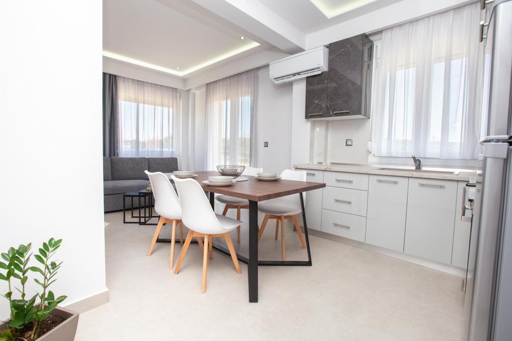 Marane Luxury Suites ネア・ムダニア エクステリア 写真